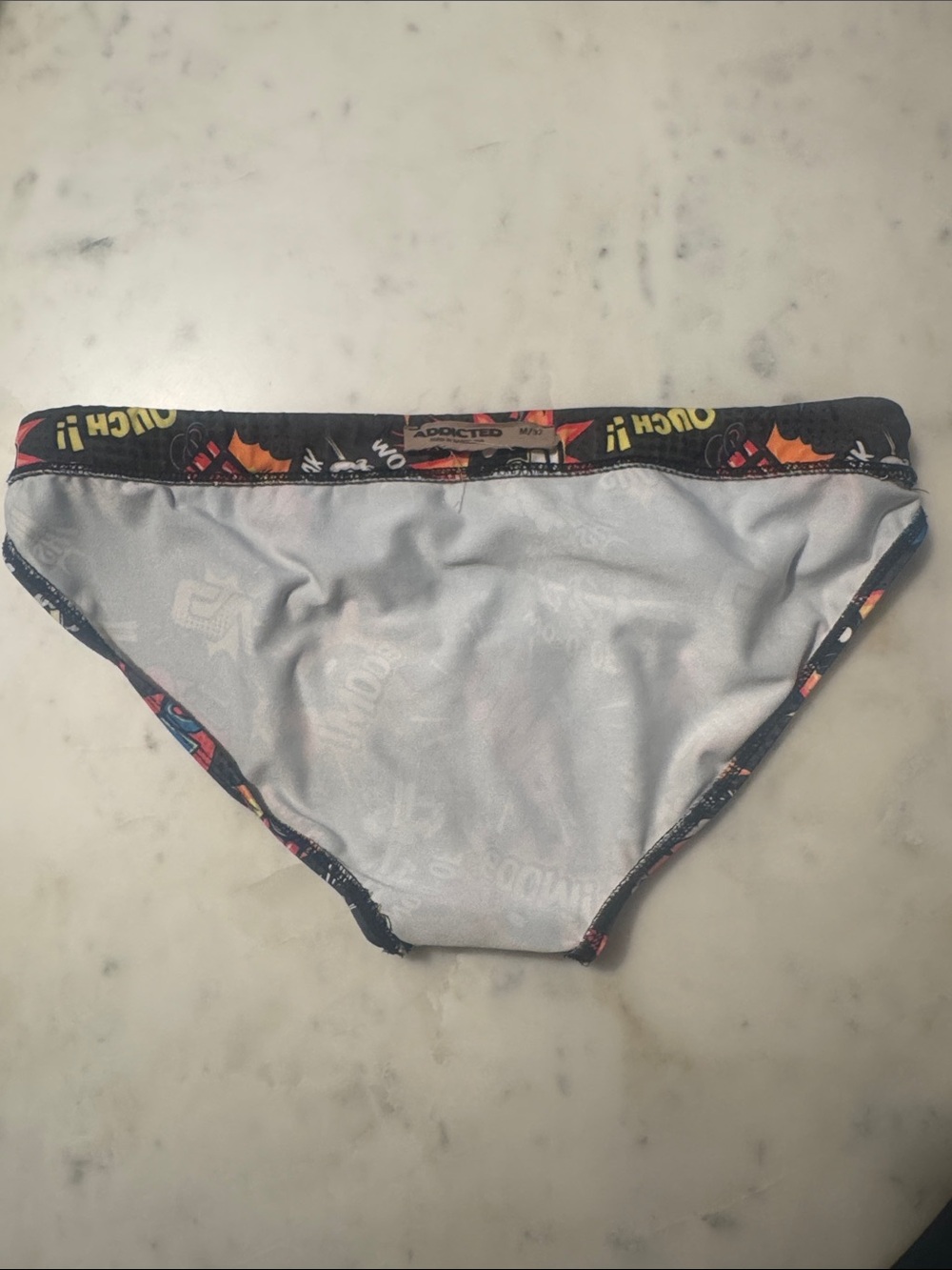 Addicted Brands Men’s Comic Print Swim Trunks - Black, Red, Blue, Yellow - Picture 4 of 4